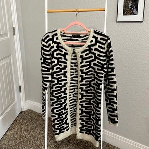 Black and cream abstract cardigan. Purchased in Israel, worn once. Clasp closure